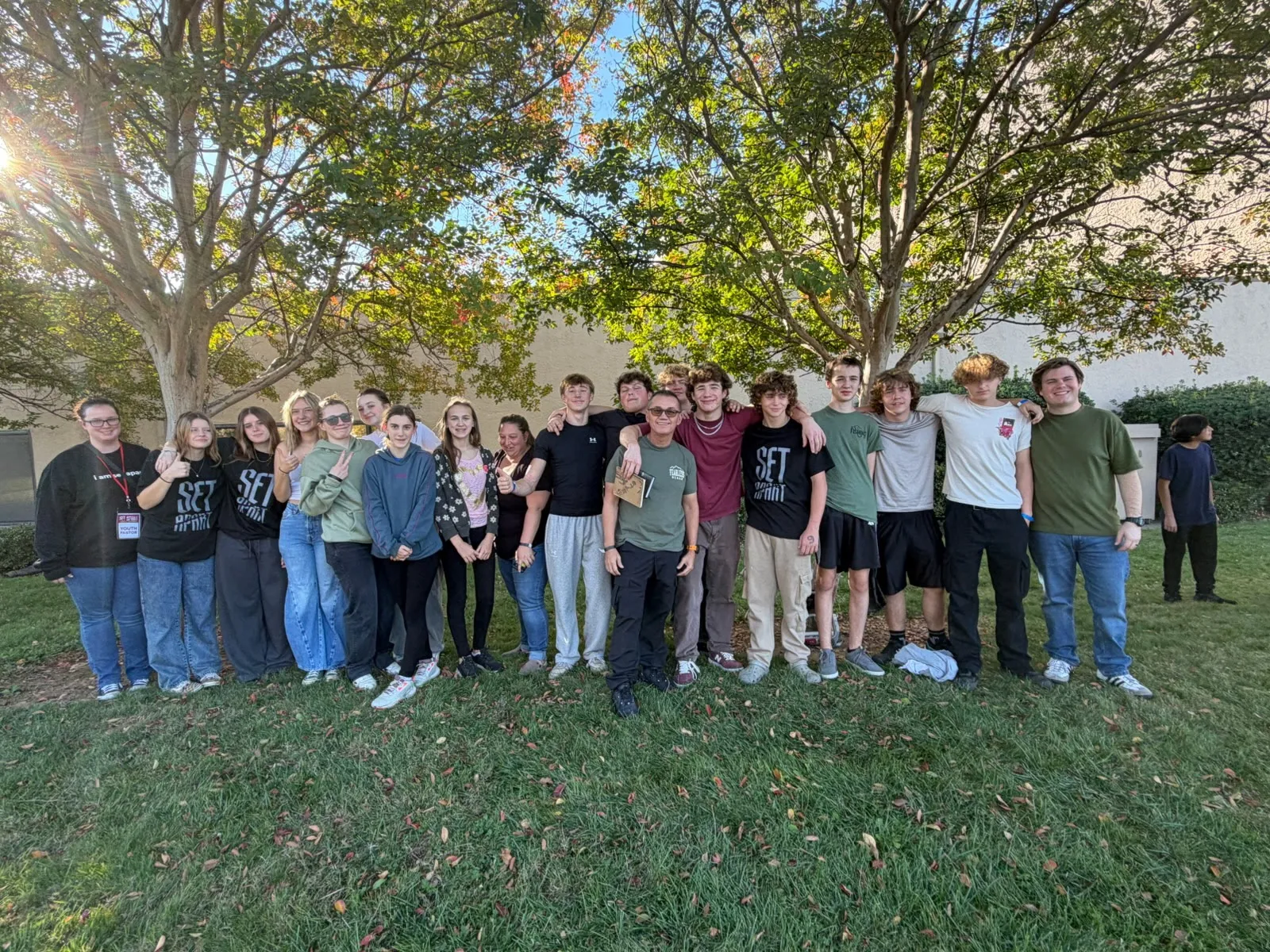 CVA Youth group photo outdoors under the trees